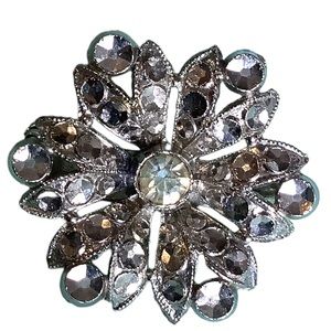 Vintage Silver Faceted Metal Flower or Snowflake Brooch With Rhinestone Center